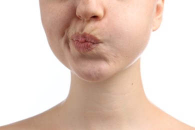 Photo of Woman rinsing mouth with mouthwash on white background, closeup. Oral hygiene