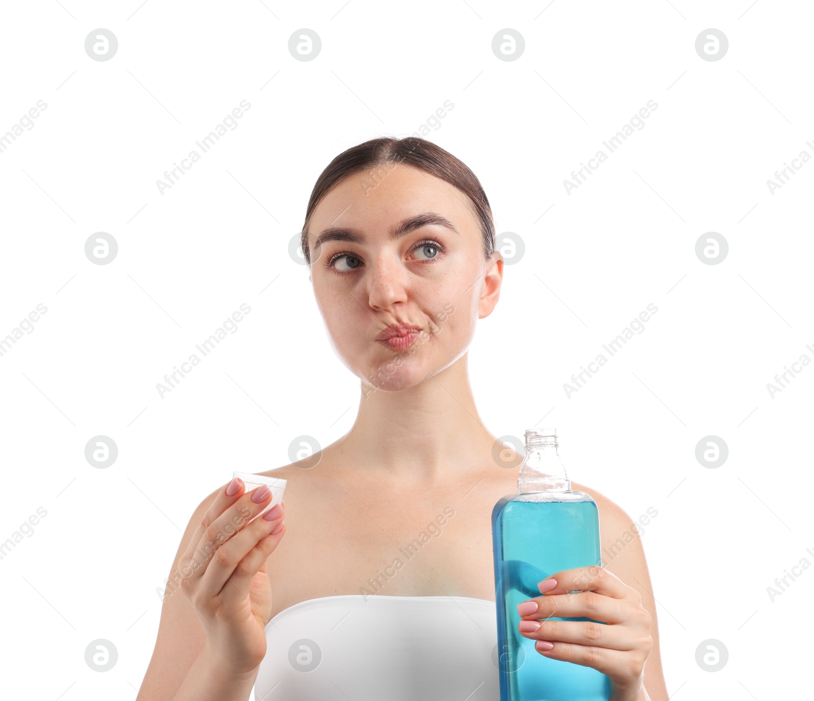 Photo of Woman rinsing mouth with mouthwash on white background. Oral hygiene