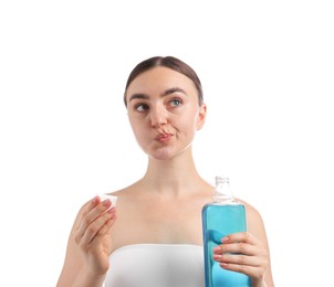 Photo of Woman rinsing mouth with mouthwash on white background. Oral hygiene