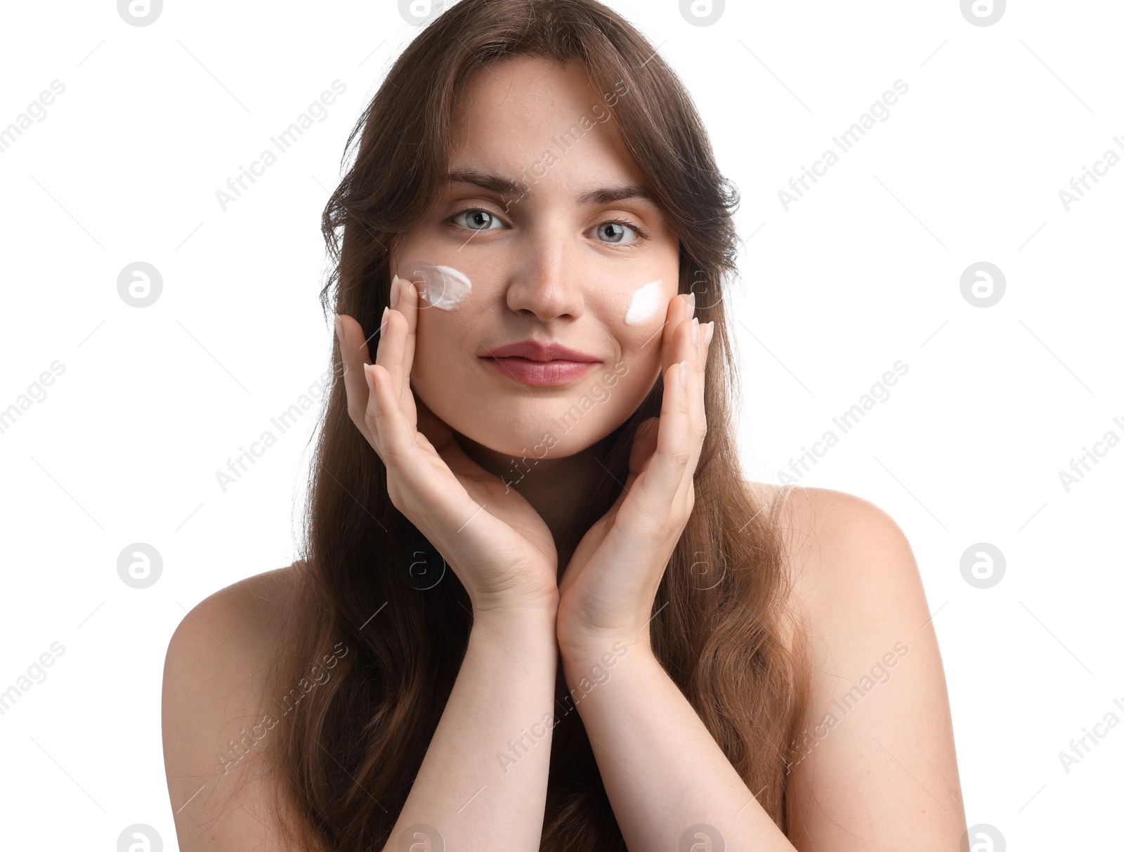 Photo of Beautiful woman with cream on her face against white background