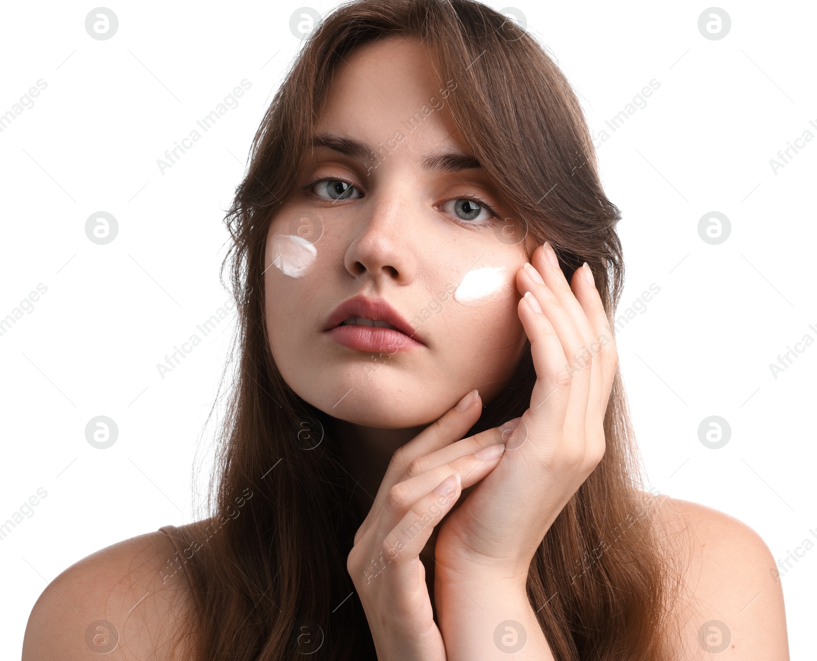 Photo of Beautiful woman with cream on her face against white background, closeup