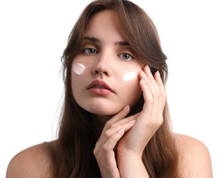 Photo of Beautiful woman with cream on her face against white background, closeup
