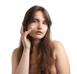 Photo of Beautiful woman with cream on her face against white background