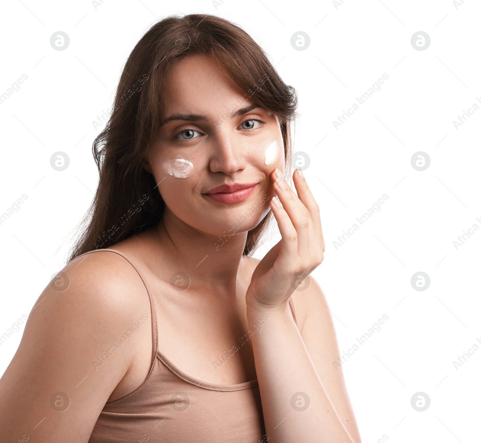 Photo of Beautiful woman with cream on her face against white background