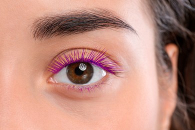 Image of Young woman with beautiful colorful eyelashes, closeup