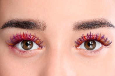 Image of Young woman with beautiful colorful eyelashes, closeup