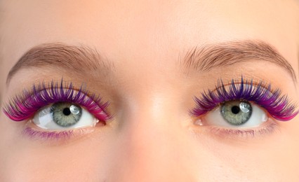 Image of Young woman with beautiful colorful eyelashes, closeup