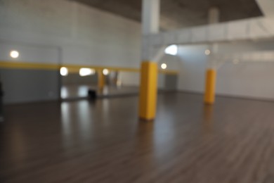 Photo of Blurred view of beautiful empty large studio