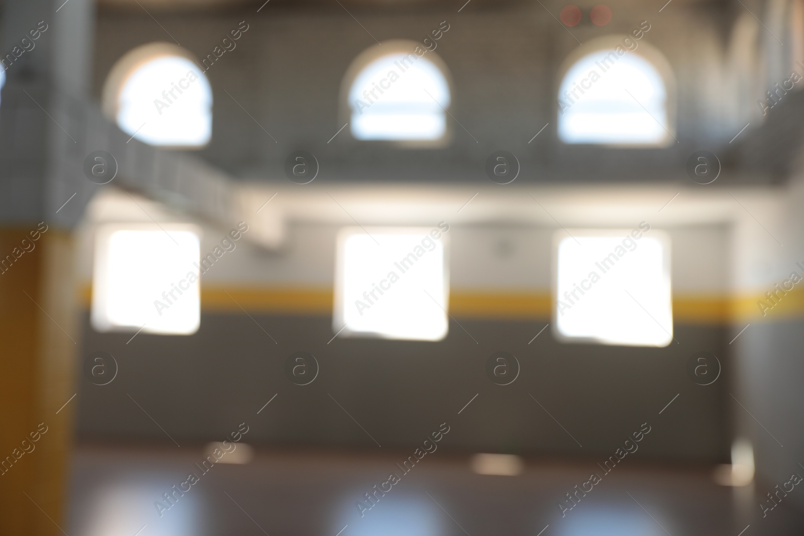 Blurred view of spacious room with many windows Photo of Blurred view of spacious room with many windows