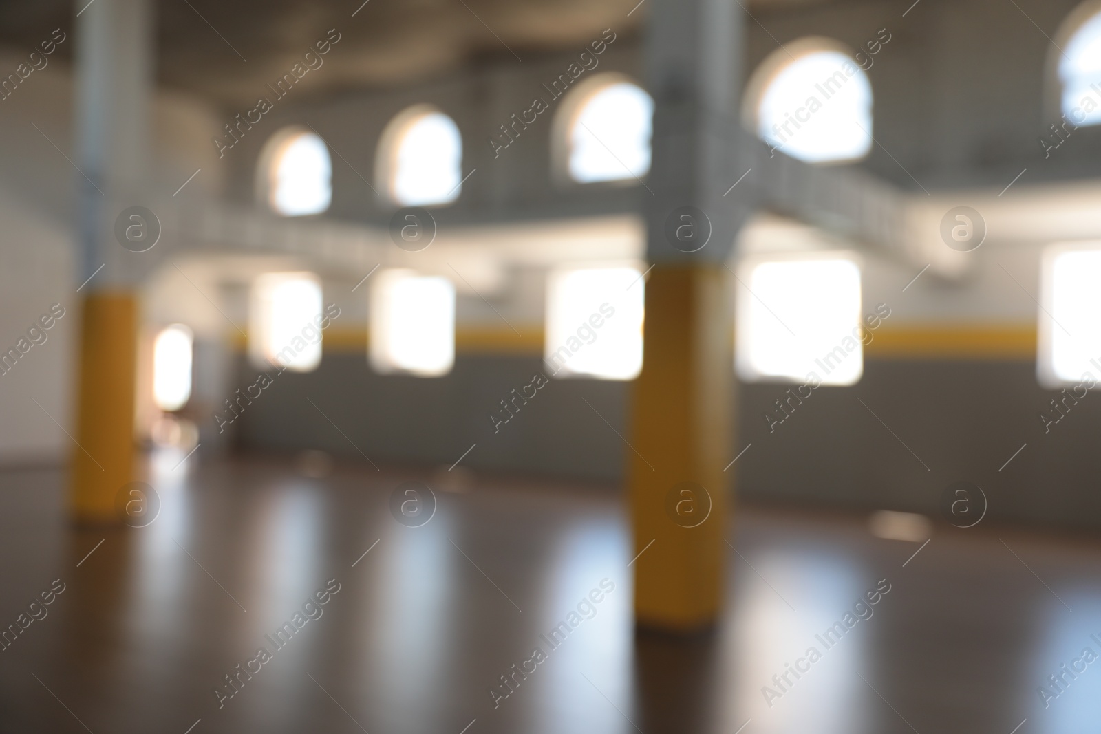 Blurred view of spacious room with many windows Photo of Blurred view of spacious room with many windows
