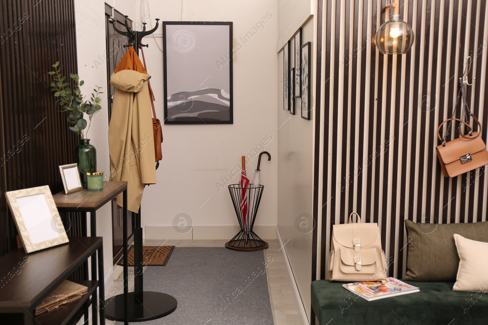 Photo of Modern hallway interior with stylish furniture and paintings