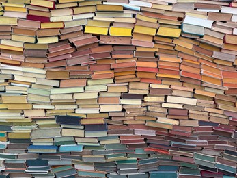 Photo of Wassenaar, Netherlands - April 24, 2025: Installation of many colorful books at Voorlinden museum