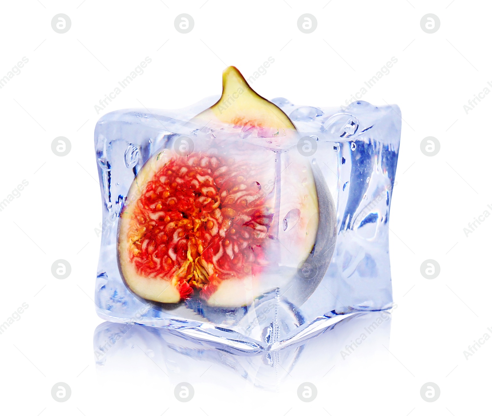 Image of Half of fresh fig inside ice cube isolated on white