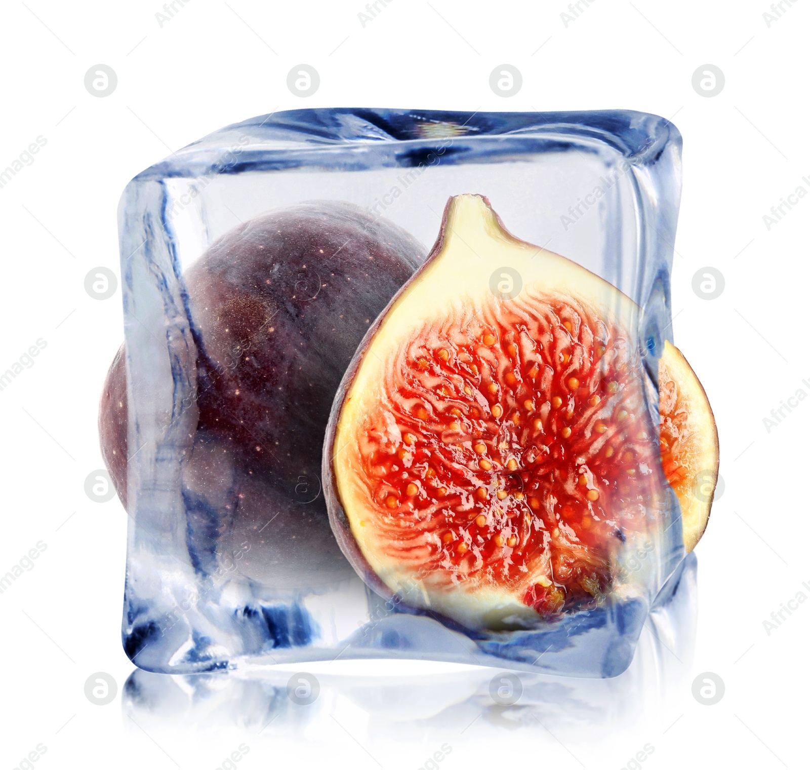 Image of Fresh figs inside ice cube isolated on white