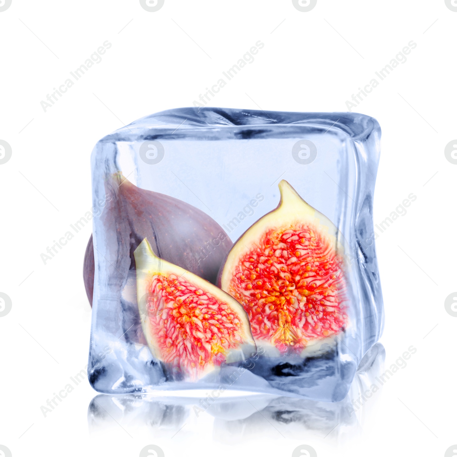 Image of Fresh figs inside ice cube isolated on white