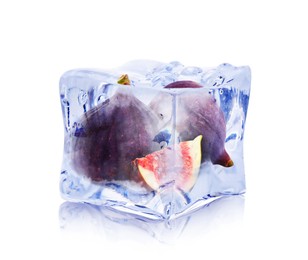 Image of Fresh figs inside ice cube isolated on white