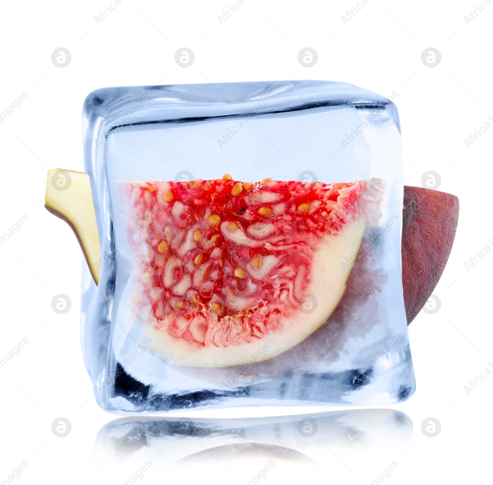 Image of Piece of fresh fig inside ice cube isolated on white