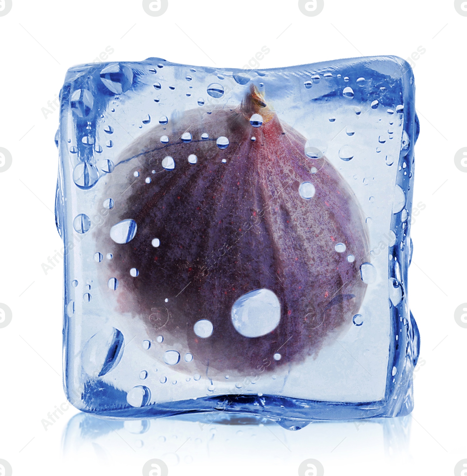 Image of Fresh fig inside ice cube isolated on white