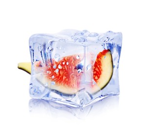 Image of Piece of fresh fig inside ice cube isolated on white
