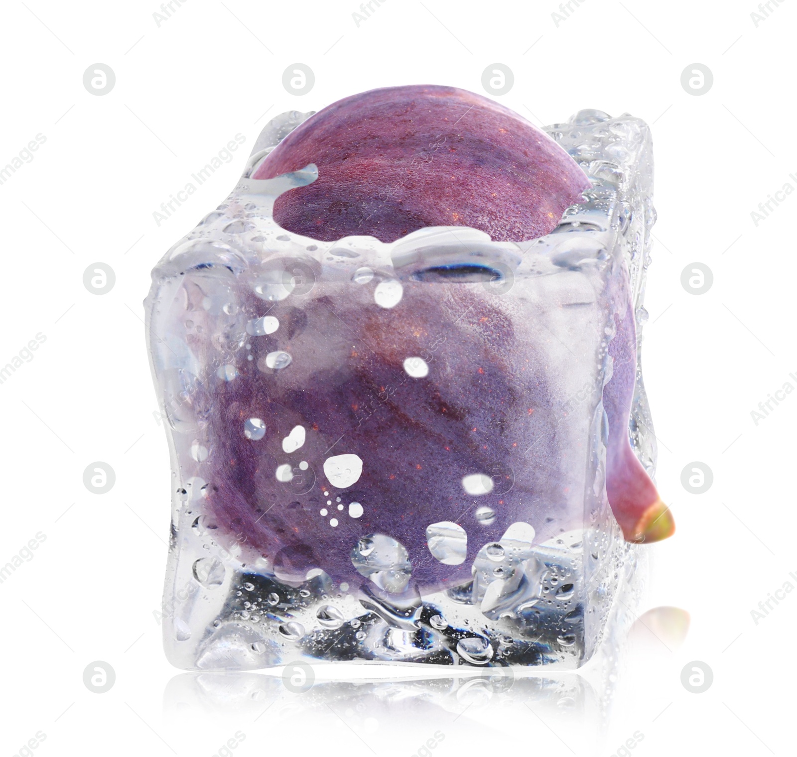 Image of Fresh fig inside ice cube isolated on white