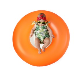 Photo of Cute little baby in sunglasses with inflatable ring on white background, top view