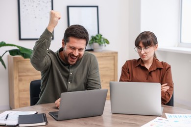 Photo of Woman feeling jealous of her colleague's success in office