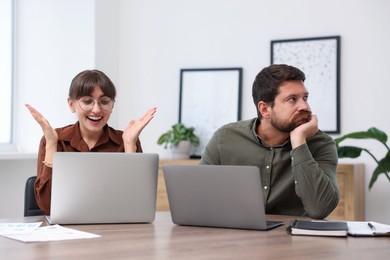 Photo of Man feeling jealous of his colleague's success in office
