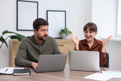 Photo of Man feeling jealous of his colleague's success in office