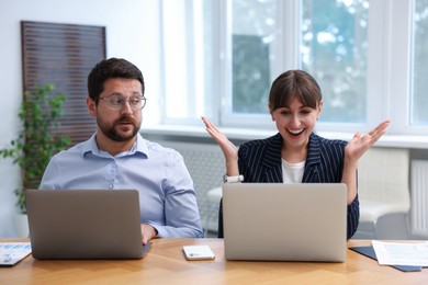 Photo of Man feeling jealous of his colleague's success in office