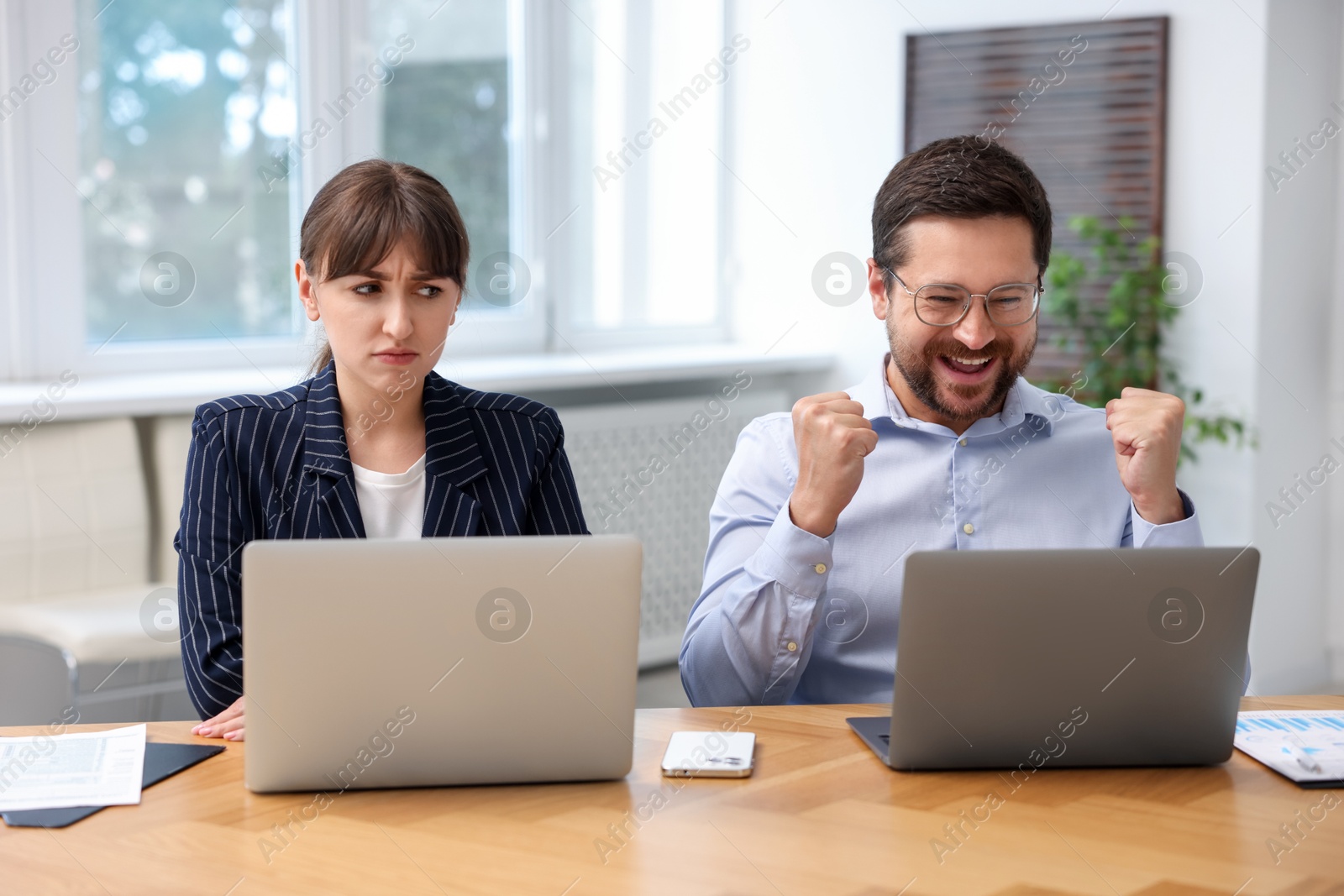 Photo of Woman feeling jealous of her colleague's success in office