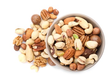 Photo of Mix of different nuts in bowl isolated on white, top view
