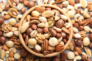 Photo of Mix of different nuts on table, flat lay