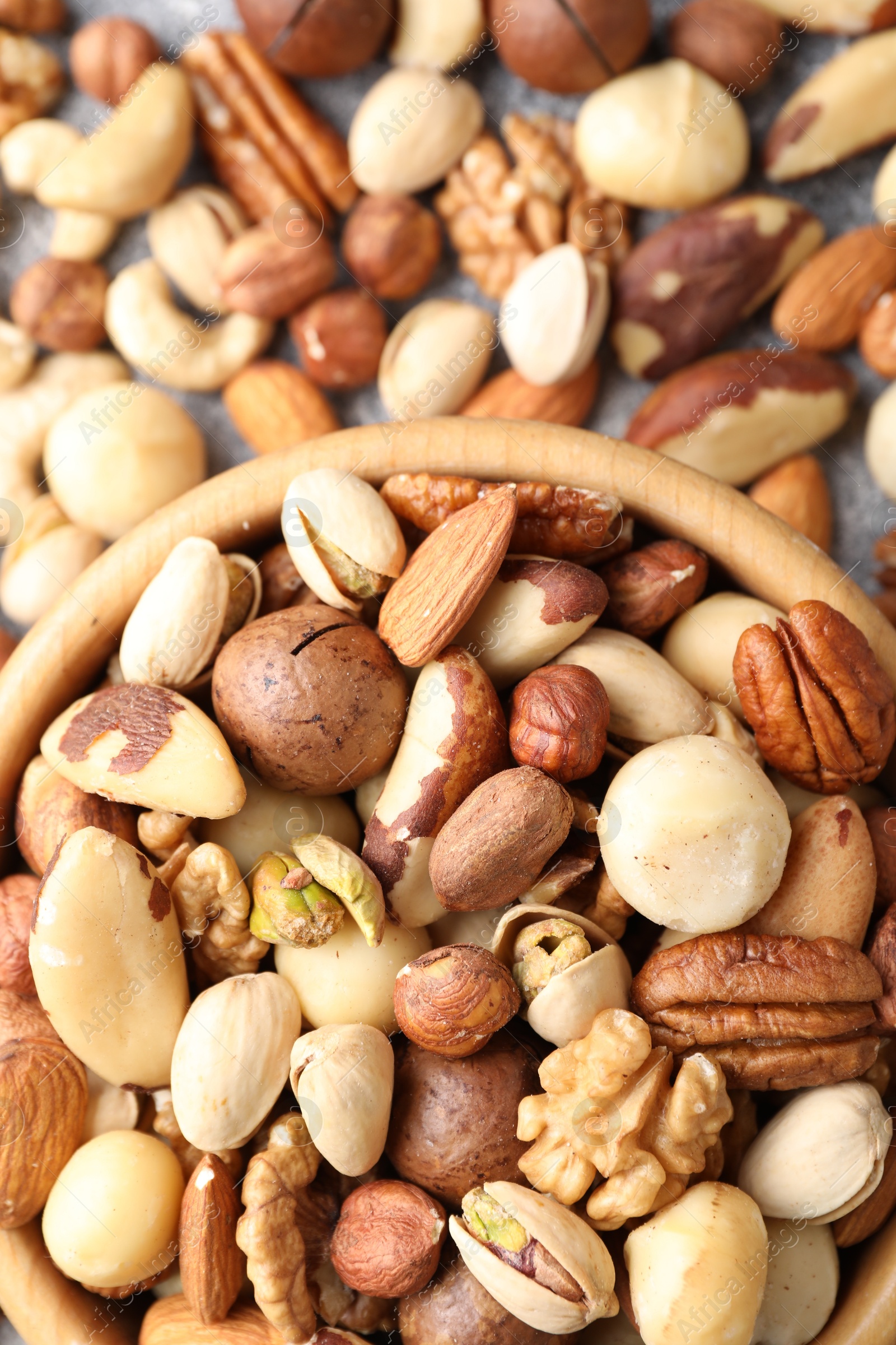 Photo of Mix of different nuts on table, flat lay