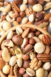 Photo of Mix of different nuts on table, flat lay