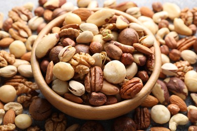 Photo of Mix of different nuts on table, closeup