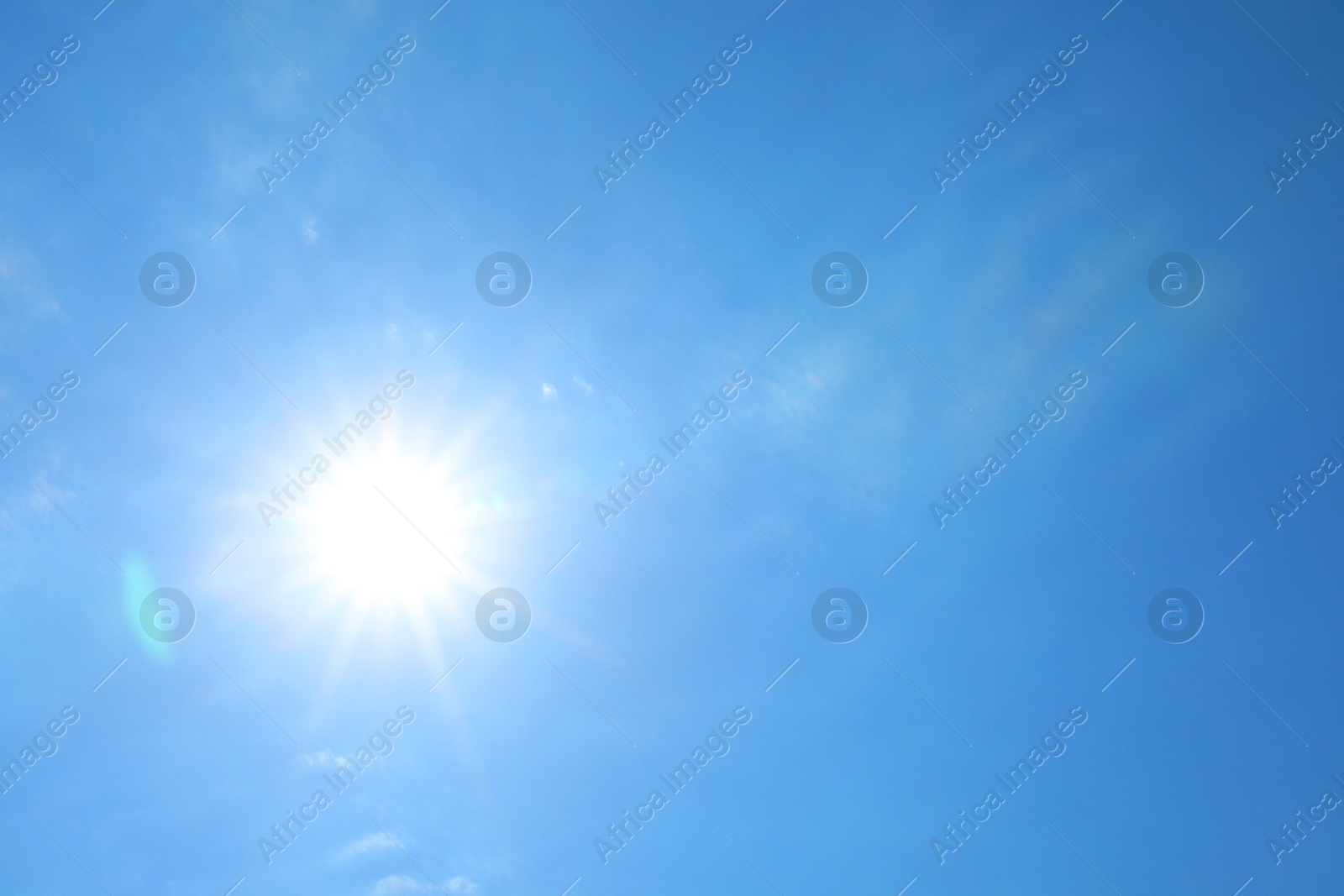 Photo of Bright sun on blue sky. Good weather