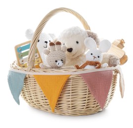 Photo of Different toys in wicker basket isolated on white