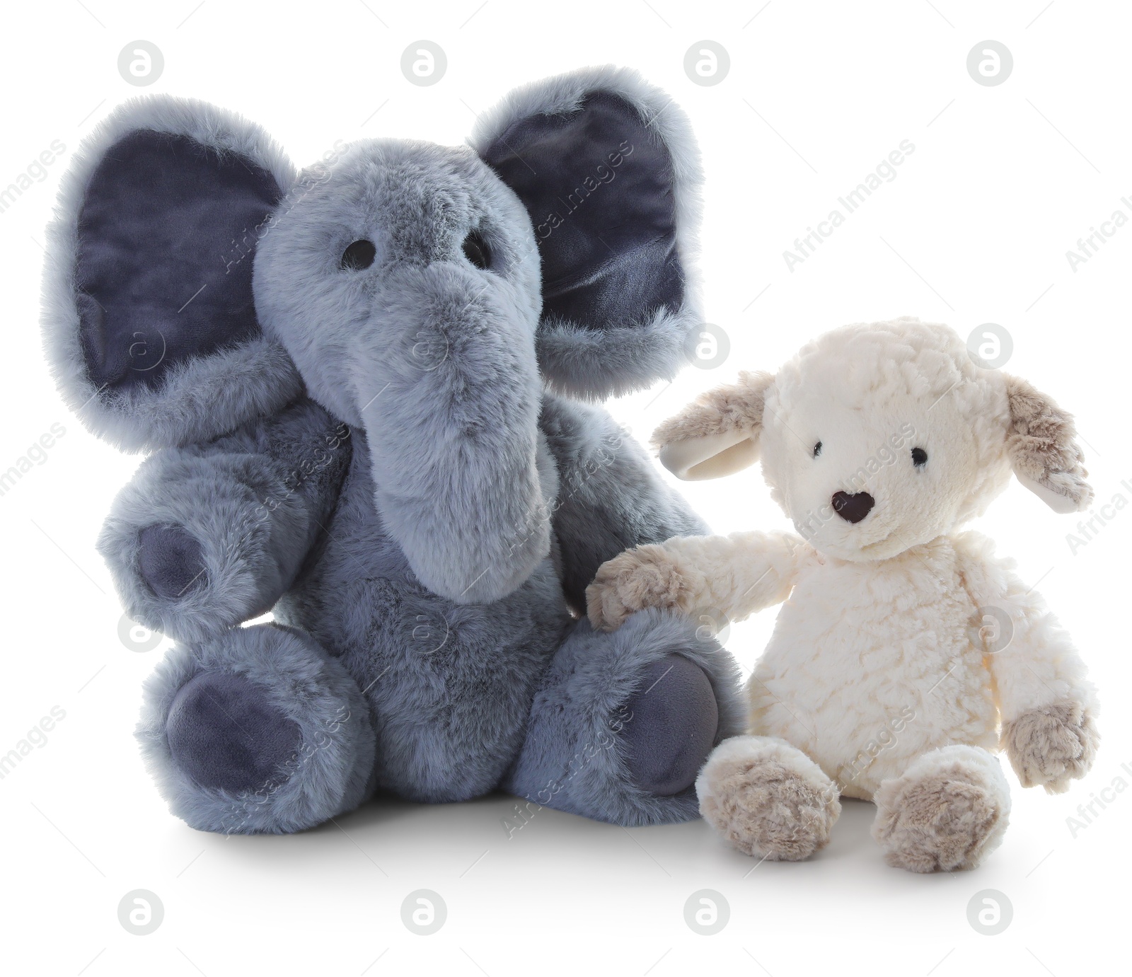 Photo of Toy elephant and sheep isolated on white
