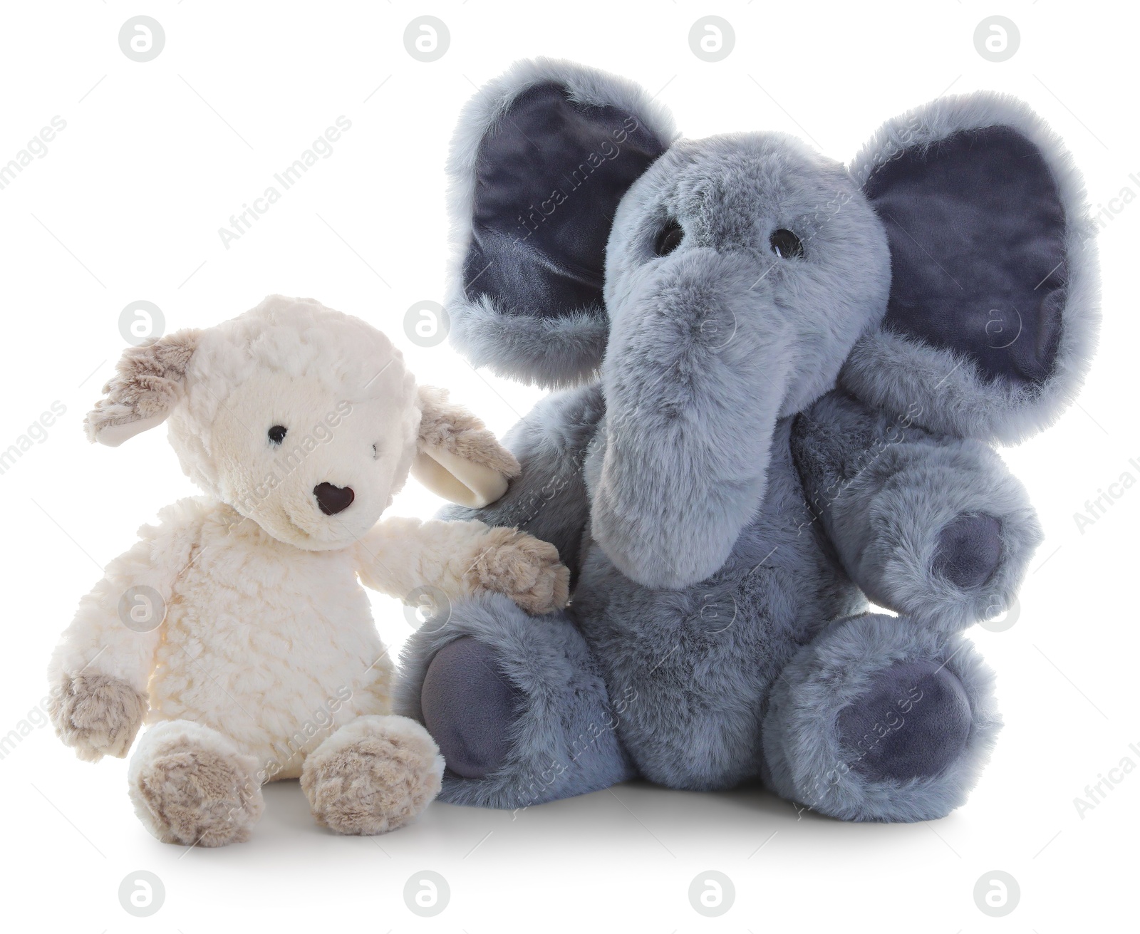 Photo of Toy elephant and sheep isolated on white
