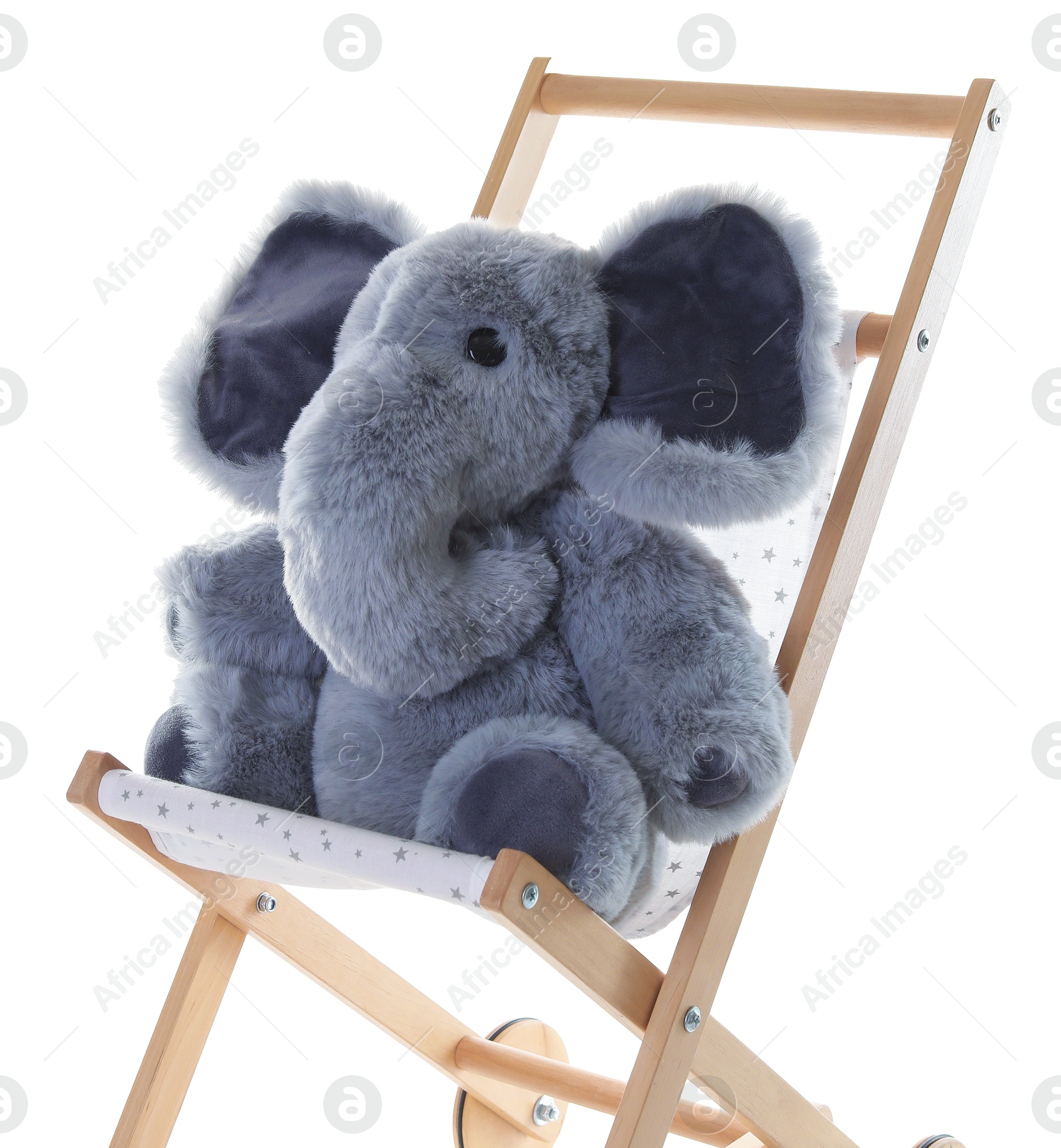 Photo of Toy elephant on stroller isolated on white
