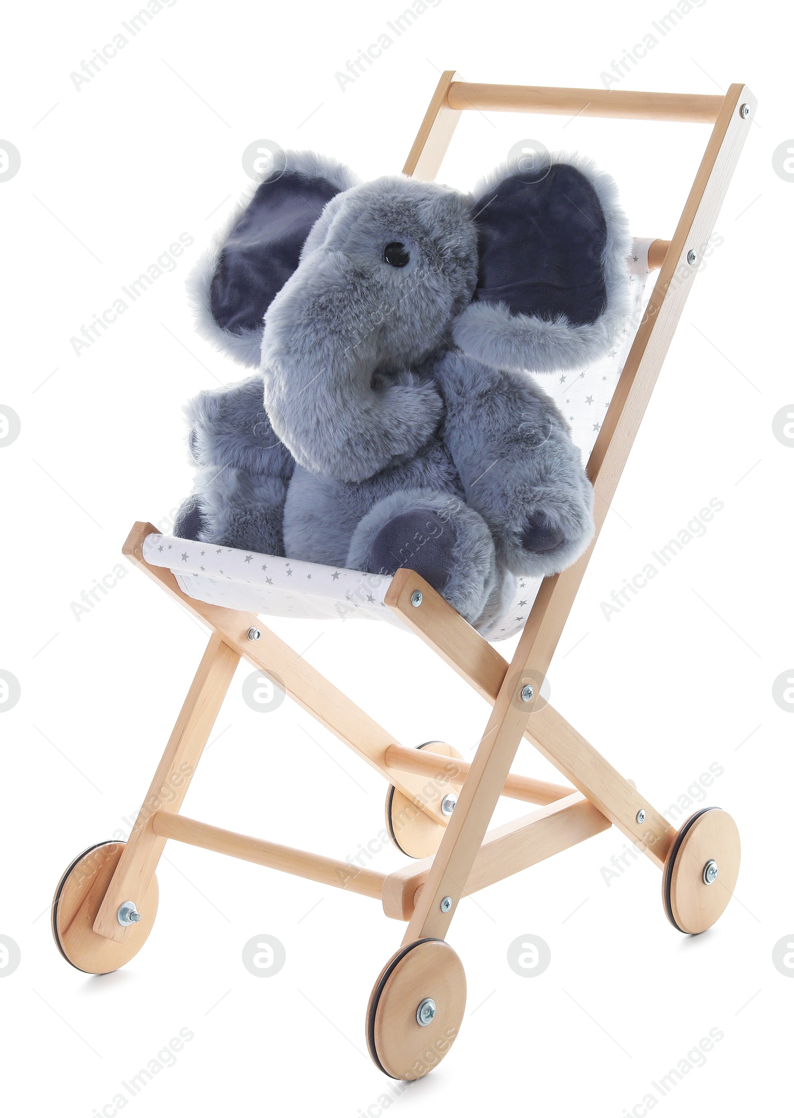 Photo of Toy elephant on stroller isolated on white