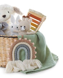 Photo of Different toys in wicker basket isolated on white