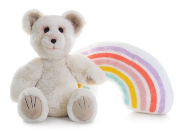 Photo of Toy rainbow and teddy bear isolated on white