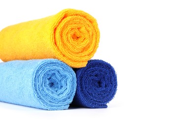 Photo of Stack of bright terry towels isolated on white