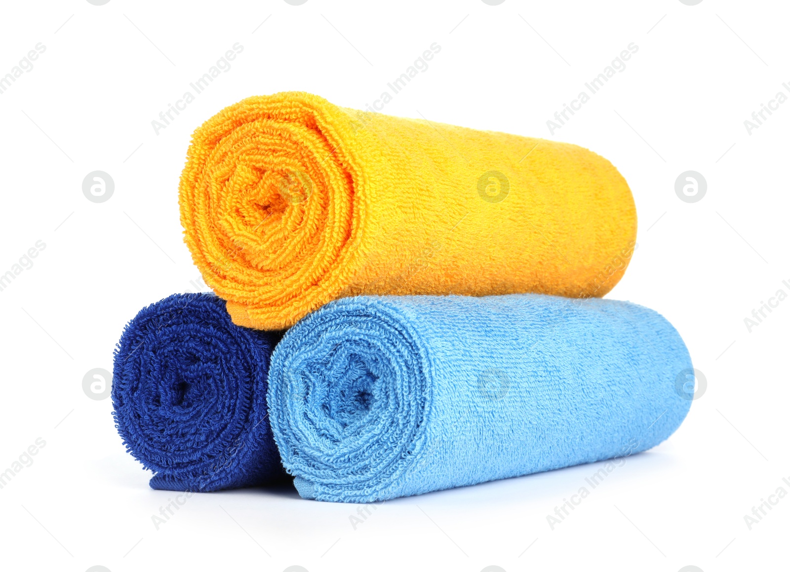 Photo of Stack of bright terry towels isolated on white