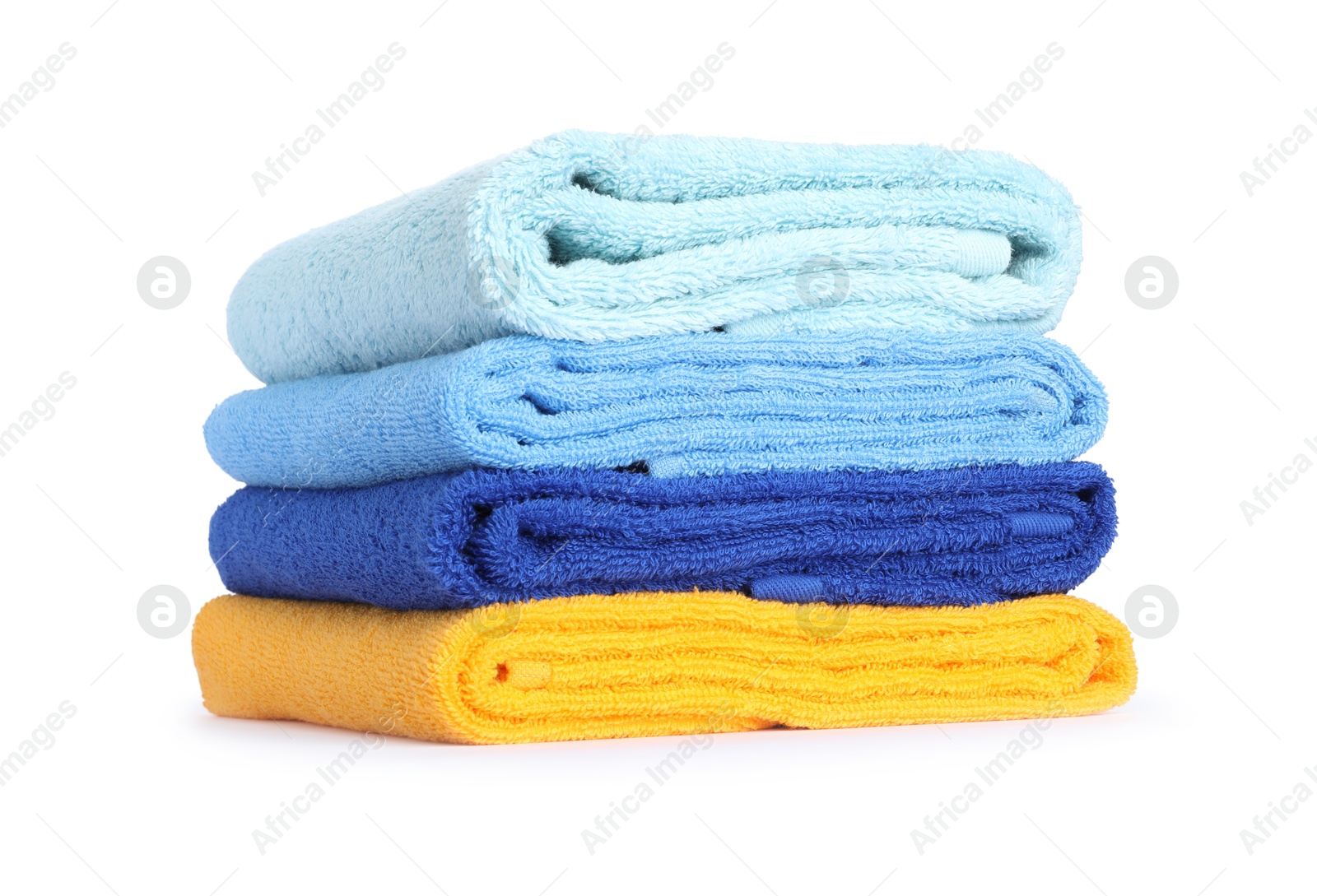 Photo of Stack of bright terry towels isolated on white