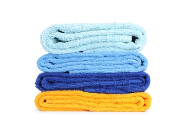 Photo of Stack of bright terry towels isolated on white