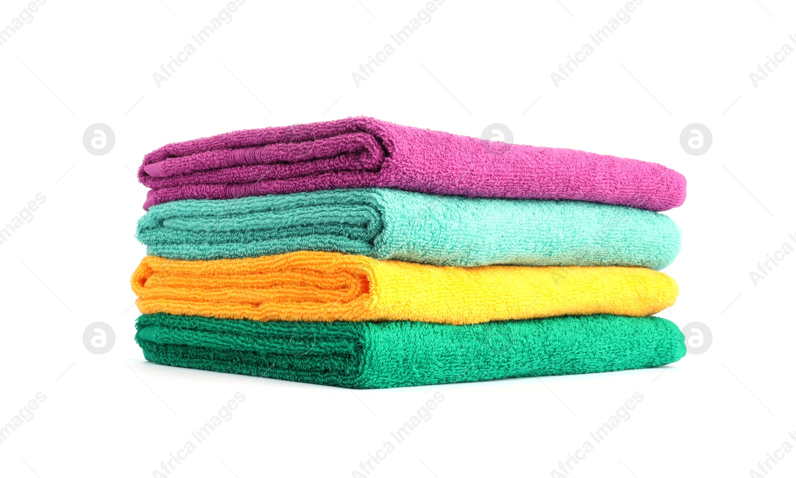 Photo of Stack of bright terry towels isolated on white