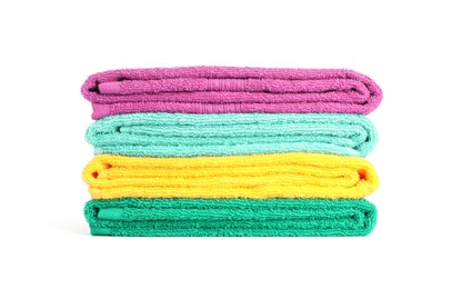 Photo of Stack of bright terry towels isolated on white