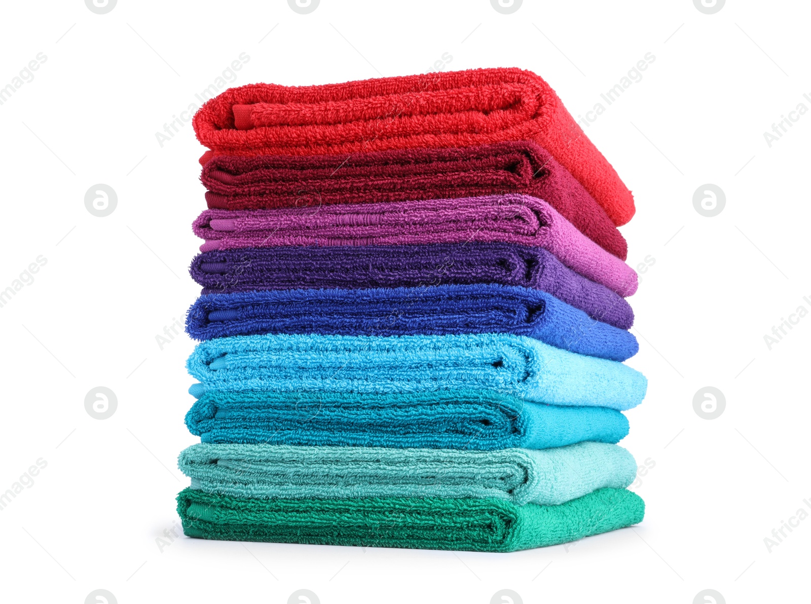 Photo of Stack of bright terry towels isolated on white